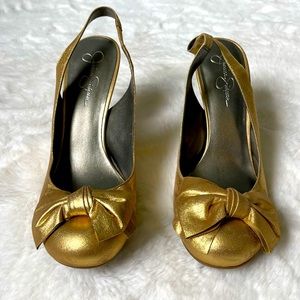 Gold sling backs with cute bow detail